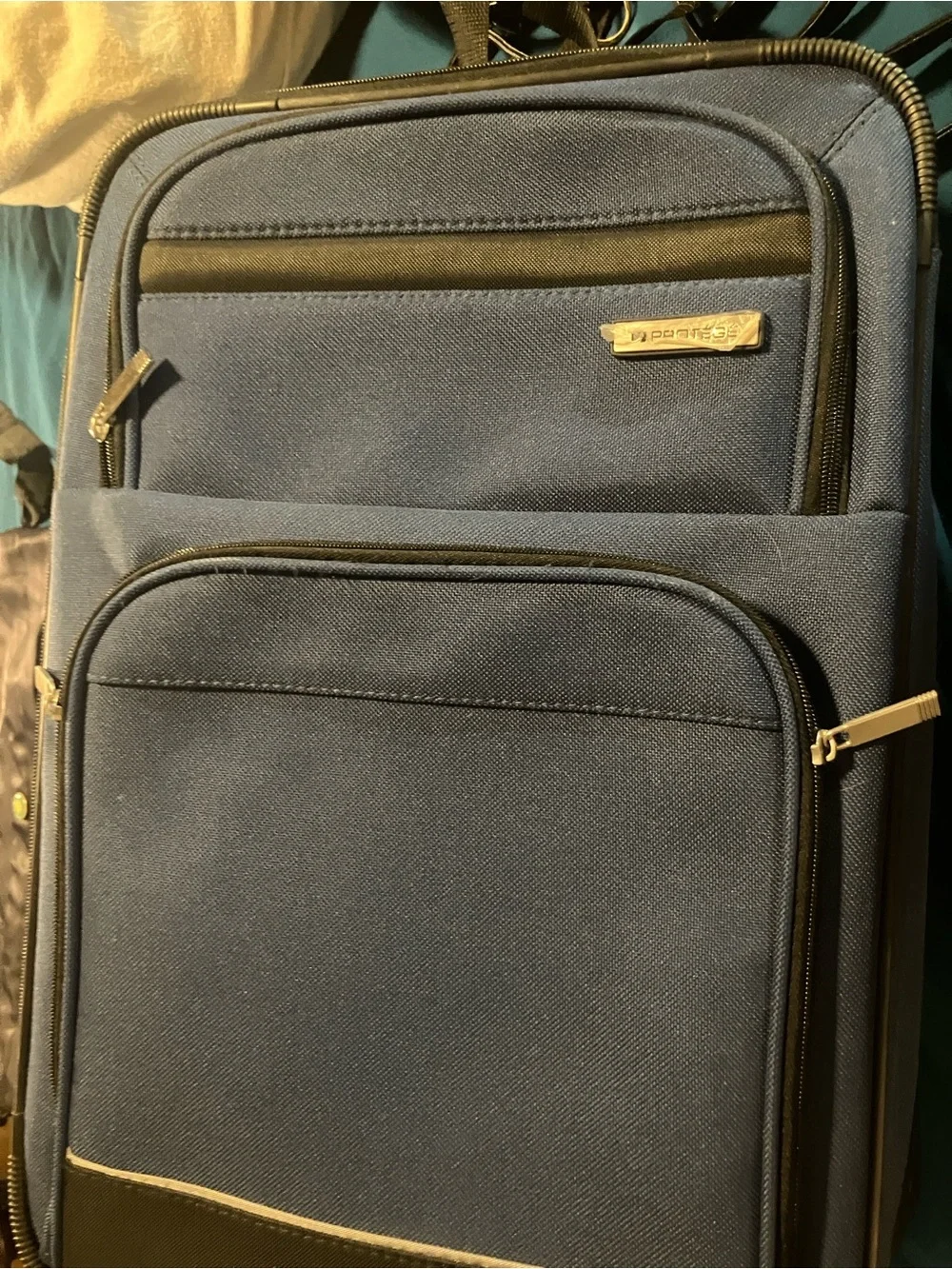 Protege carry on suitcase never used , 20”x14”x7” , blue with black trim